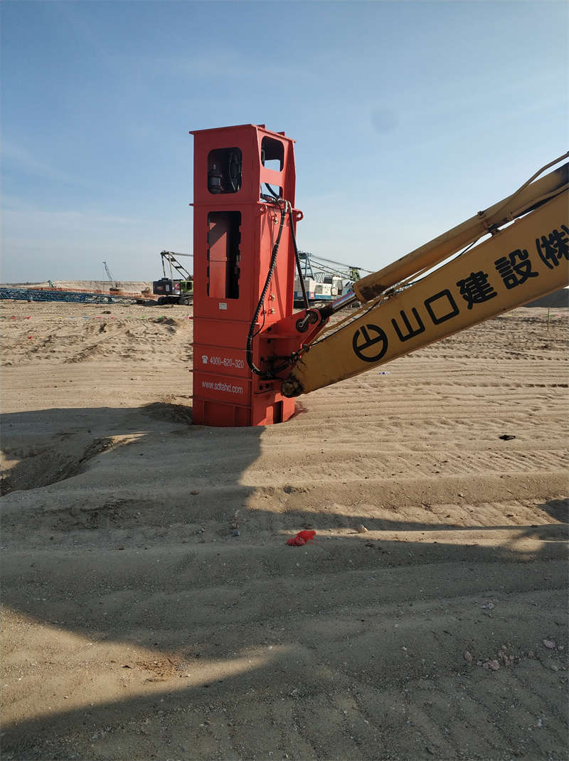 The lower part of the rapid impact compactor is pressed into the soil