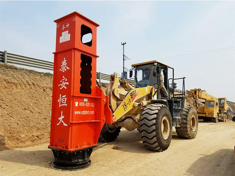 Rapid impact compactor parked by the road