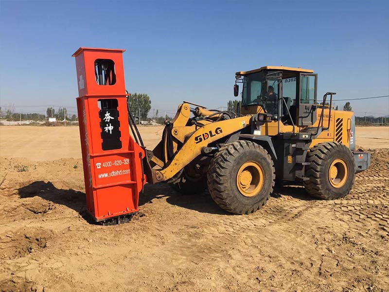 Small rapid impact compactor installed on loader